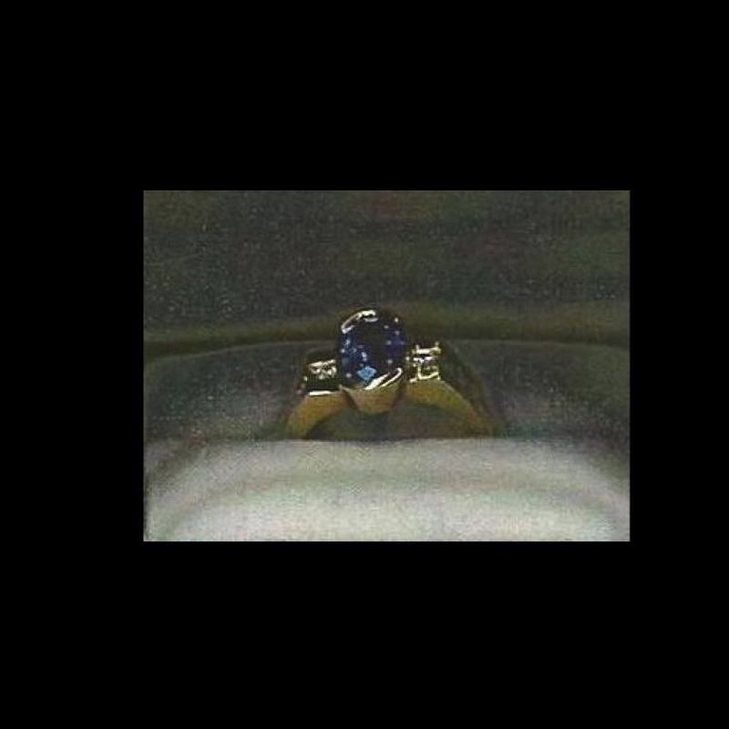 Oval-cut Tanzanite and Diamond Ring, 18k yellow gold