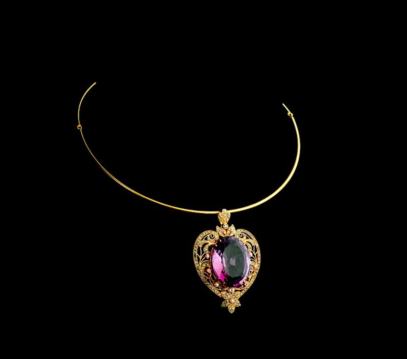 Oval-cut Amethyst and Diamond Pendant with Necklace, 18k yellow gold.