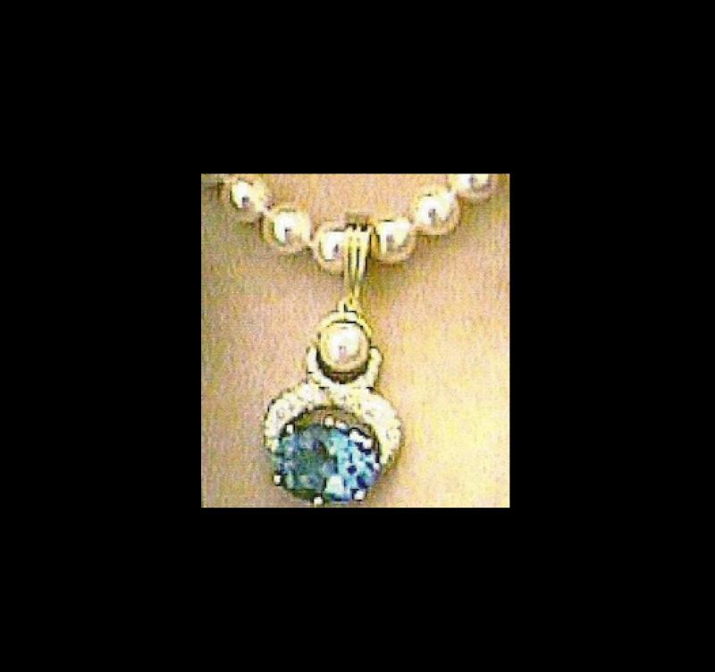 Oval-cut Topaz and Diamond Pendant with Pearl Necklace, 18k yellow gold