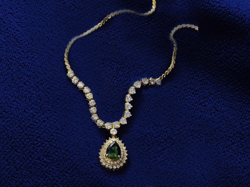 Pear Shaped Columbian Emerald and Diamond Necklace, 18k yellow gold.