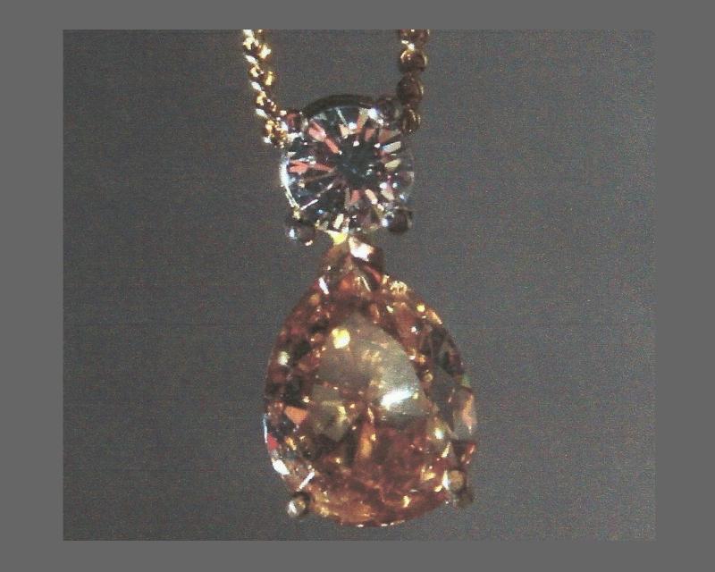 Brown-orange Pear-cut and round cabochon diamond fancy pendant, 18k yellow gold