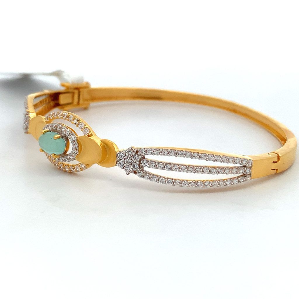 Emerald Halo and Diamond Bangle