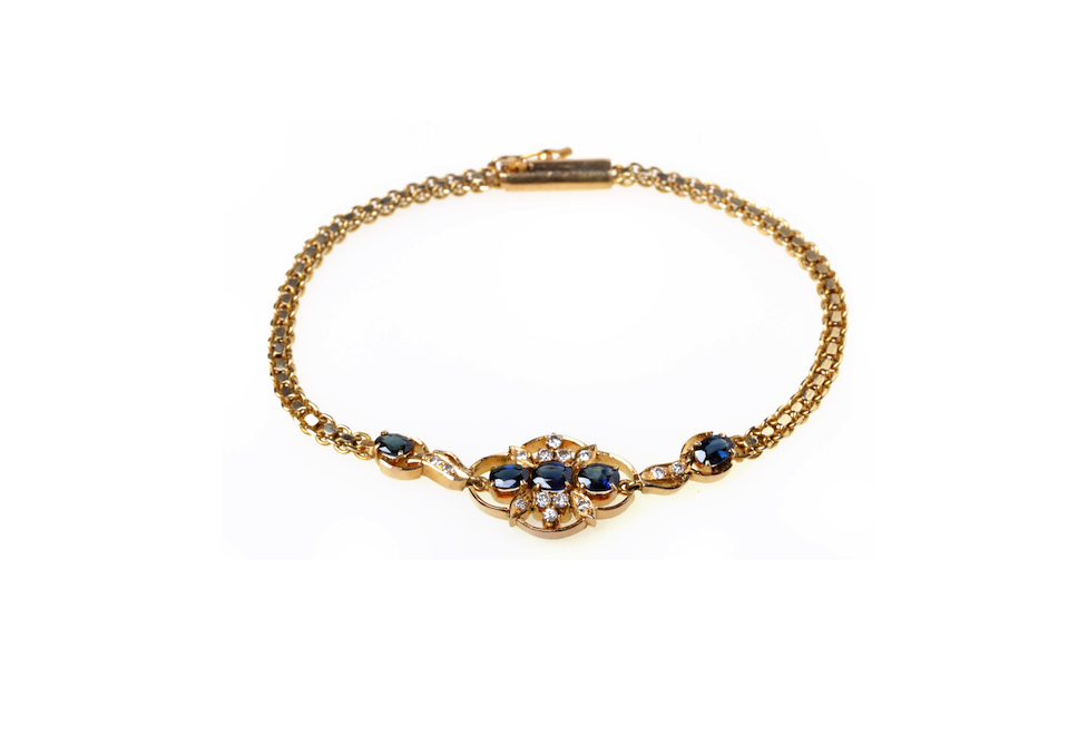 Oval Cut Blue Sapphire and Diamond Bracelet, 18k yellow gold