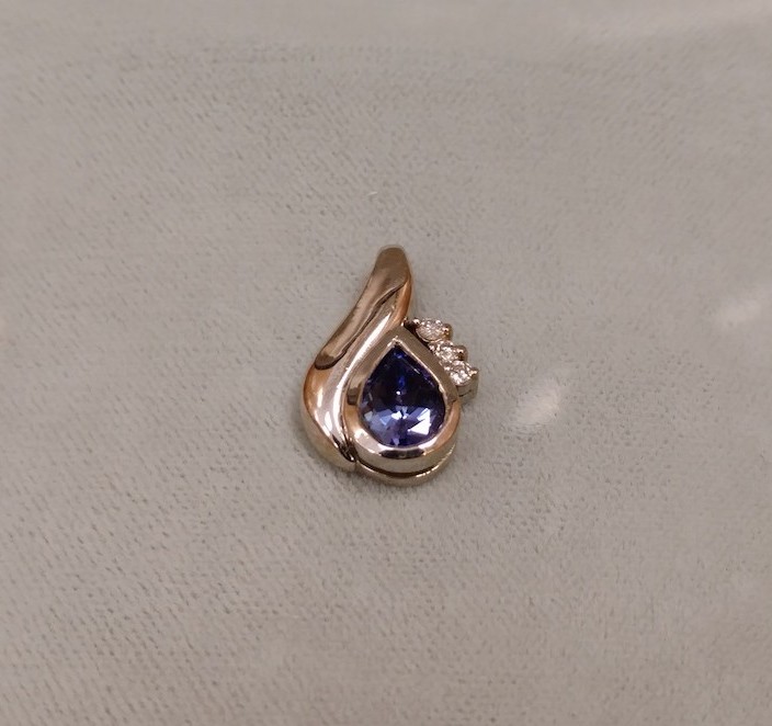 Pear-cut Blue Sapphire and Diamond Pendant, 18k yellow gold