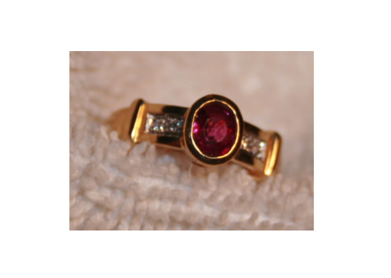 Oval Cut Ruby and Diamond Ring, 18k yellow gold