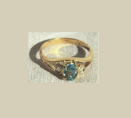 Oval-cut Aquamarine and Diamond Ring, 18k yellow gold